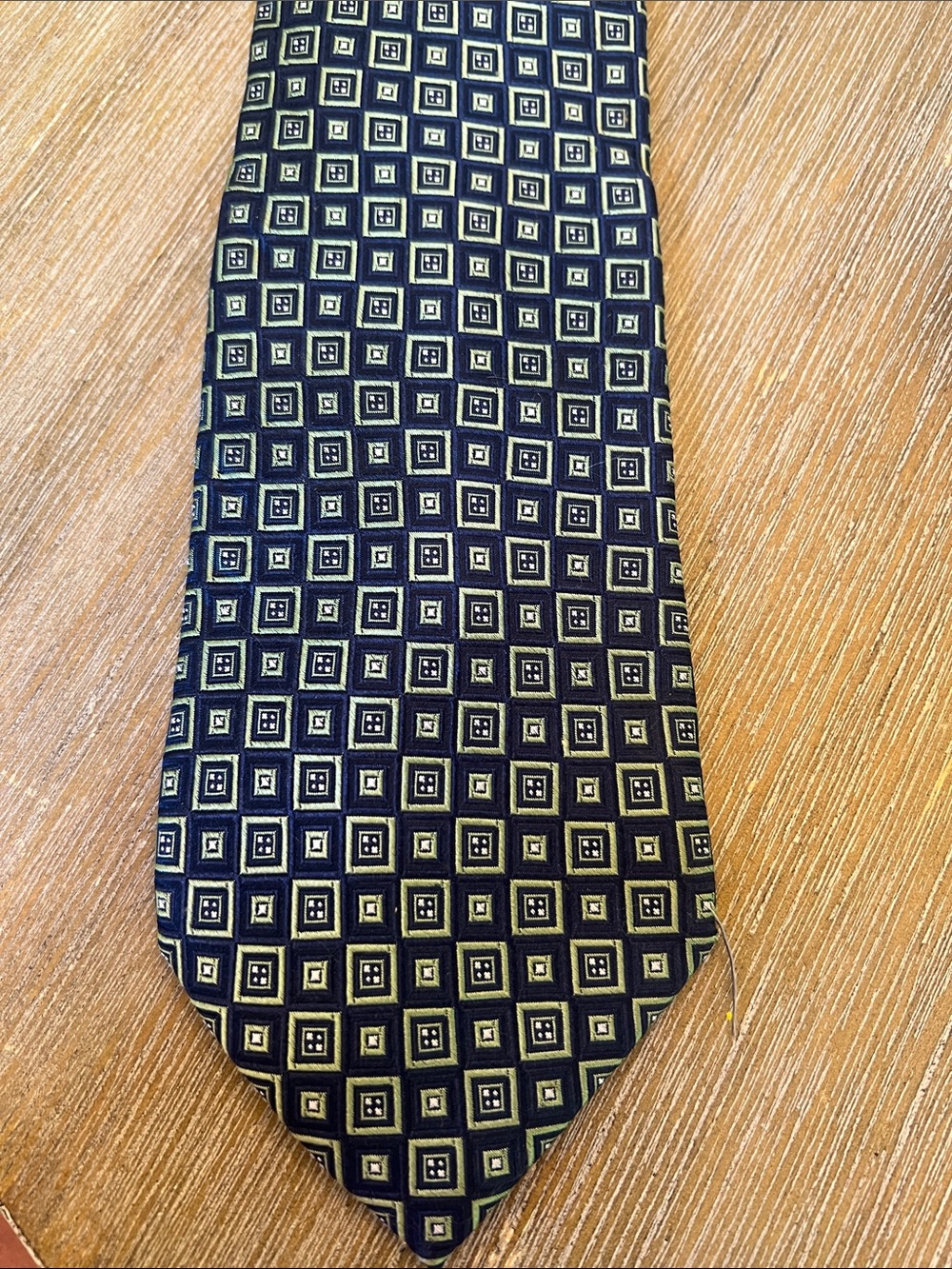 Chaps Men’s Silk Geometric tie. New in pkg. Navy and Green